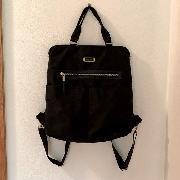 Baggallini backpack, black and gold. Only used a few times. No signs of wear.
